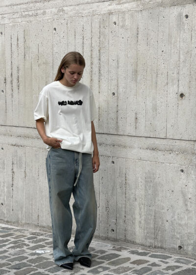 'Adult T' logo in black by Wild Animals