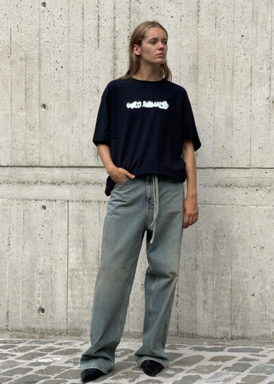 'Adult T' logo in white by Wild Animals