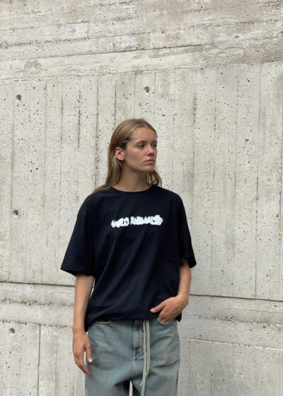 'Adult T' logo in white by Wild Animals